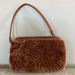 Patricia Nash Italian leather and faux fur wristlet. New without tags.